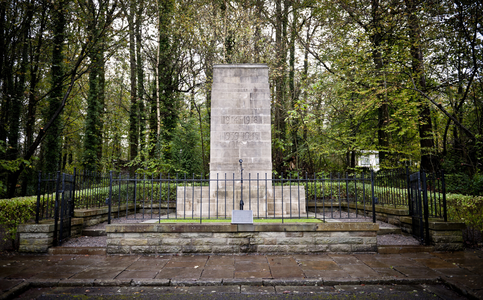 The Newbridge War Memorial. Built in 1936 to commemorate the fallen servicemen of the First World War. Rededicated at the Museum in 1996. Portland stone structure with the inscription 1914 - 1918 1939 - 1945 AT THE GOING DOWN OF THE SUN AND IN THE MORNING