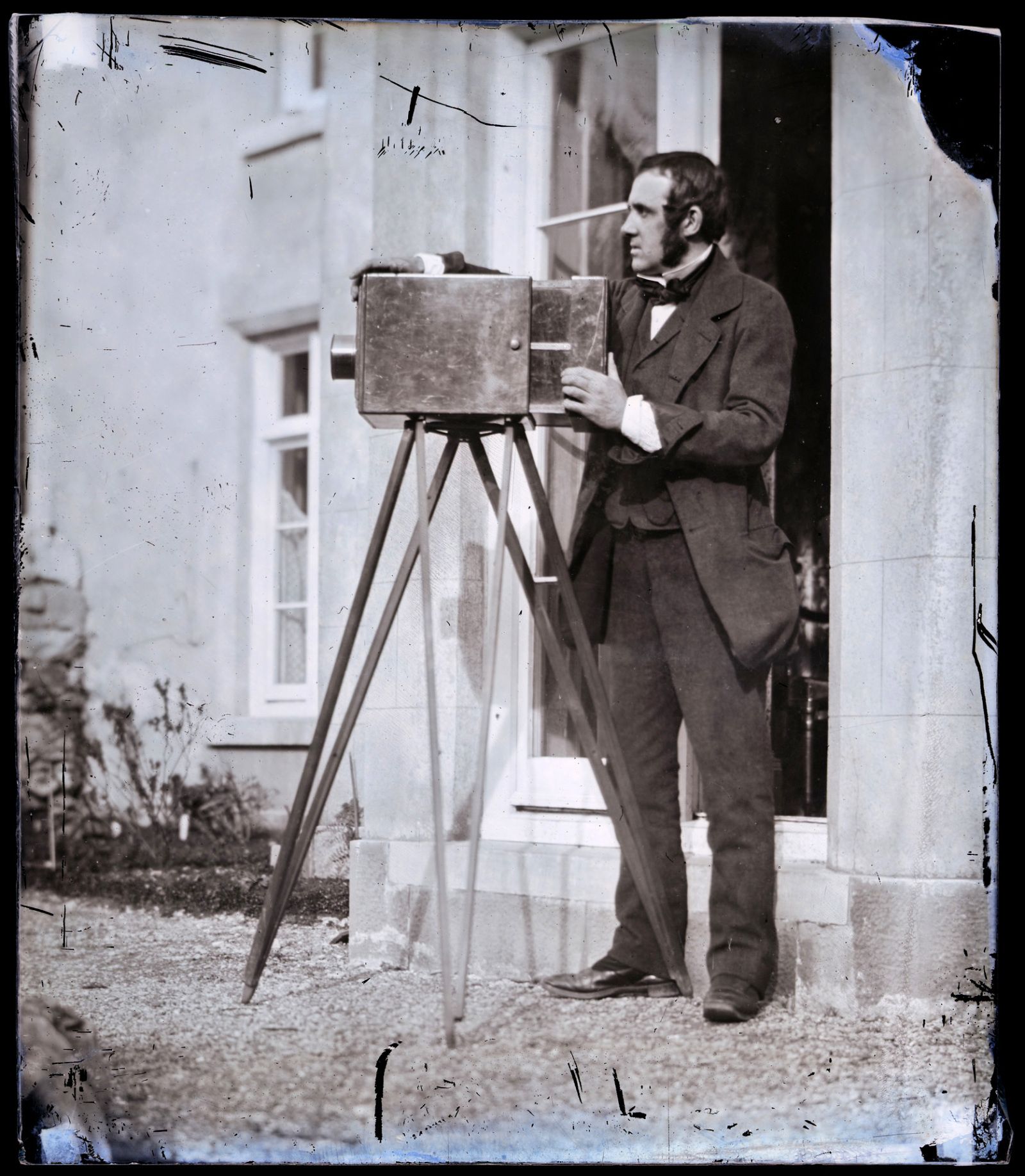 Collodion glass negative showing John with his calotype camera in 1853