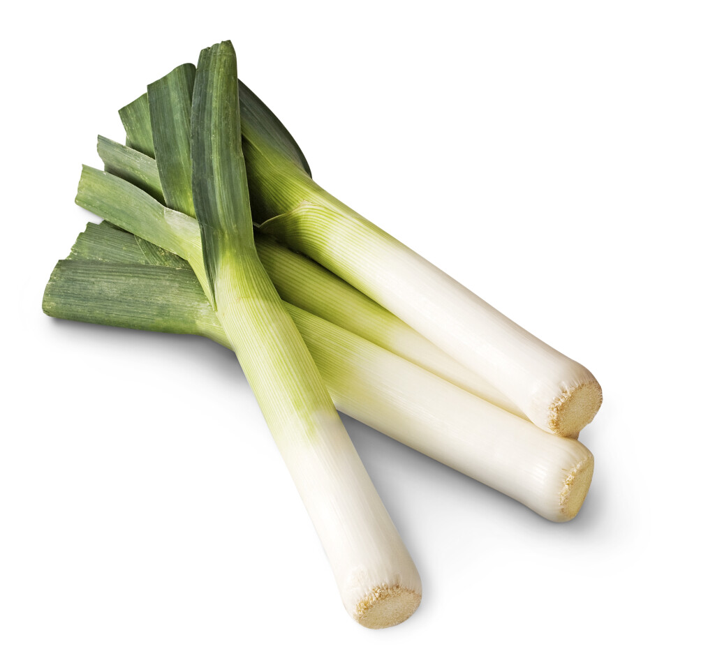 A group of leeks on a white background.