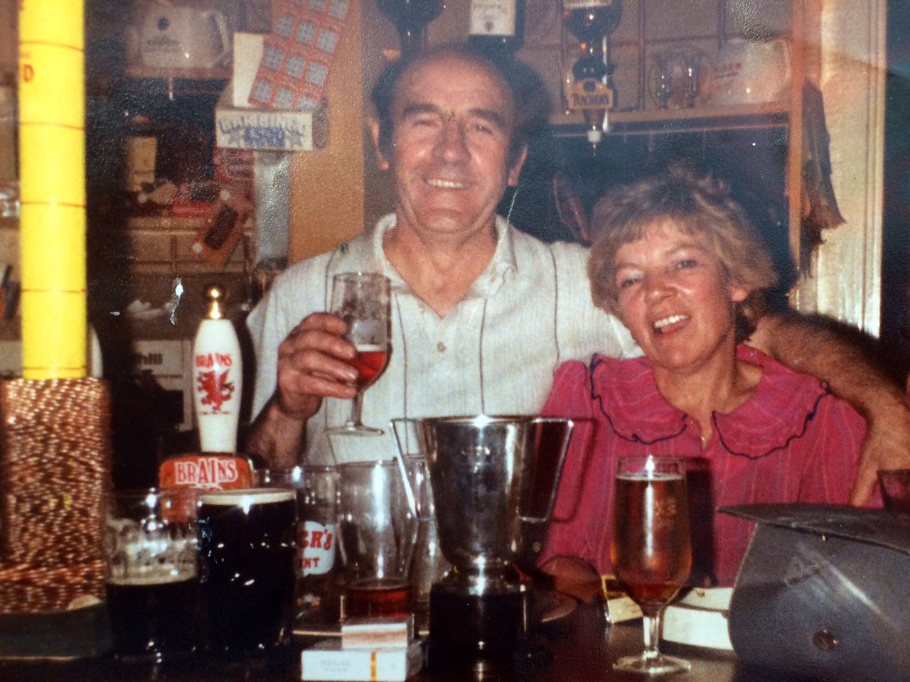 Pulling pints behind the bar in the early 80's. 
