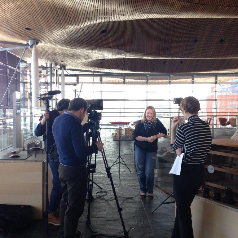 Rachel Cable being interviewed at the National Assembly for Wales