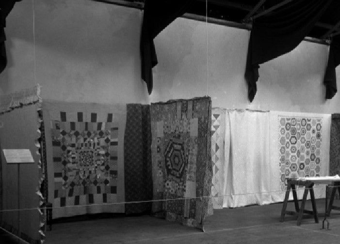 Quilts on display at St Fagans, 1951