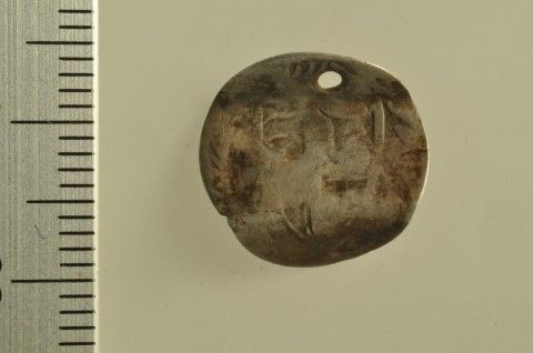 Worn commonwealth half groat reused as a love token, found by Gwyn Rees near Wenvoe, South Glamorgan, in 2012.