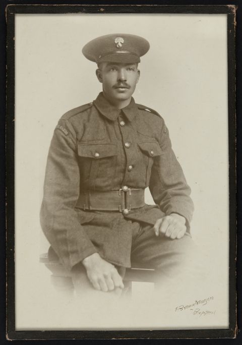 Framed studio portrait of Private Oscar Foote in uniform