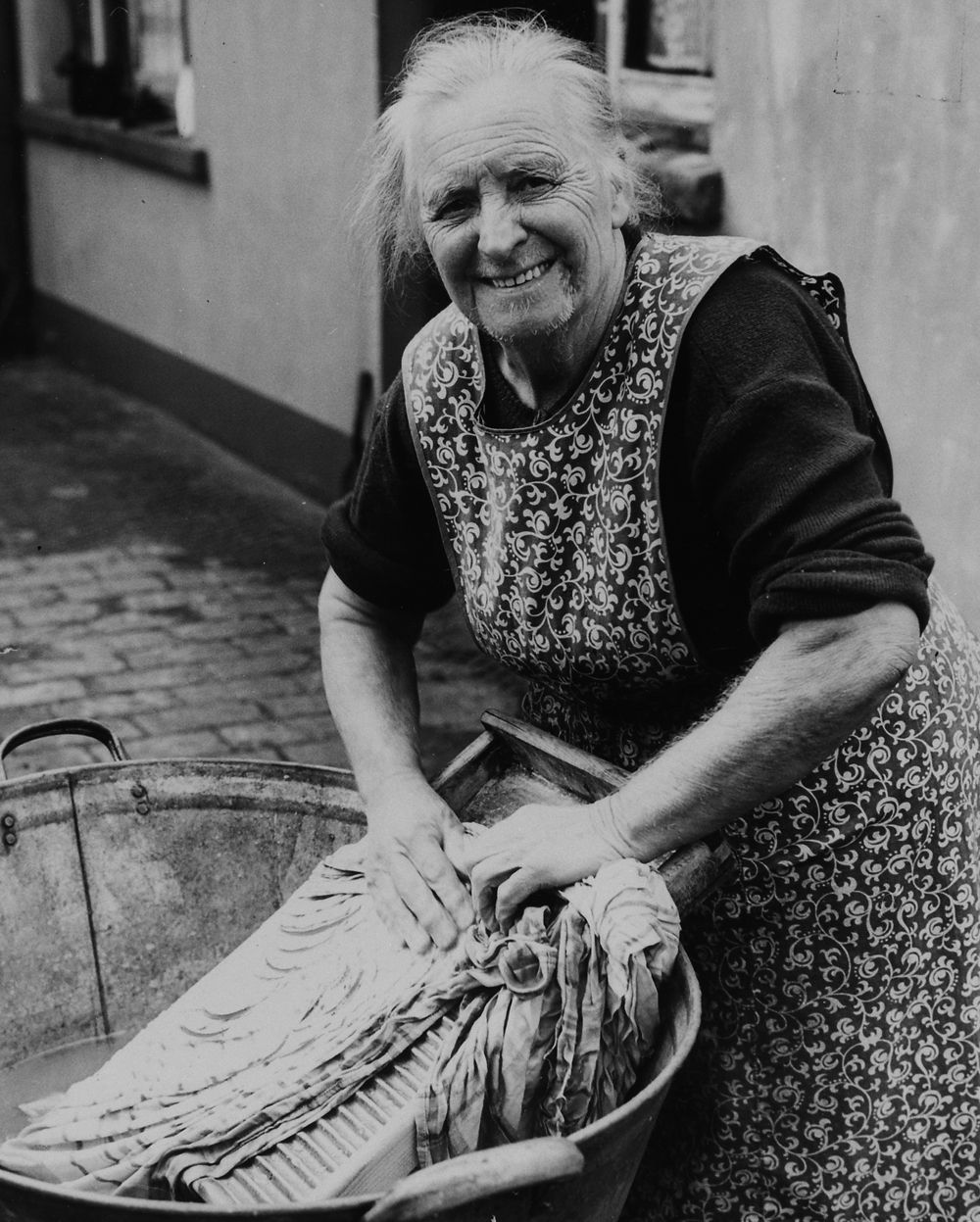  Miss Kate John using a washboard, Merthyr Tydfil in the 1940s