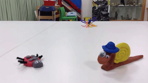 Gif animation showing clay models of insects dancing
