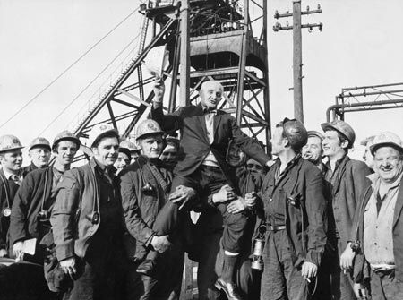 Nyk Woszczycki (2nd from left) in a group celebrating his friend Joe Hughes's retirement from Britannia Colliery