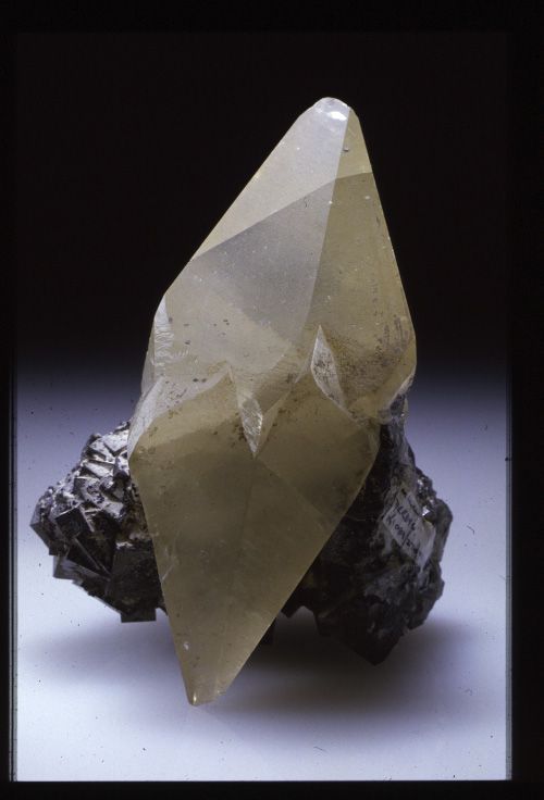A twinned scalenohedral calcite crystal from Millclose mine, Derbyshire forming part of the R.J. King mineral collection at the museum (no. NMW 83.41G.M.5085).
