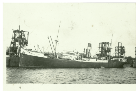 A Welsh tramp steamer loading Welsh coal at a Welsh port - The Cardiff-owned Radnor at Barry Docks in 1925