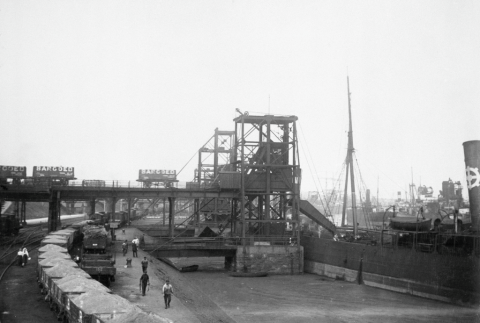 No.1 dock in 1913, when Barry docks exported 11m tons of coal. What appears to be a solid level surface in the right foreground of this scene in is fact water — thick with coal dust.