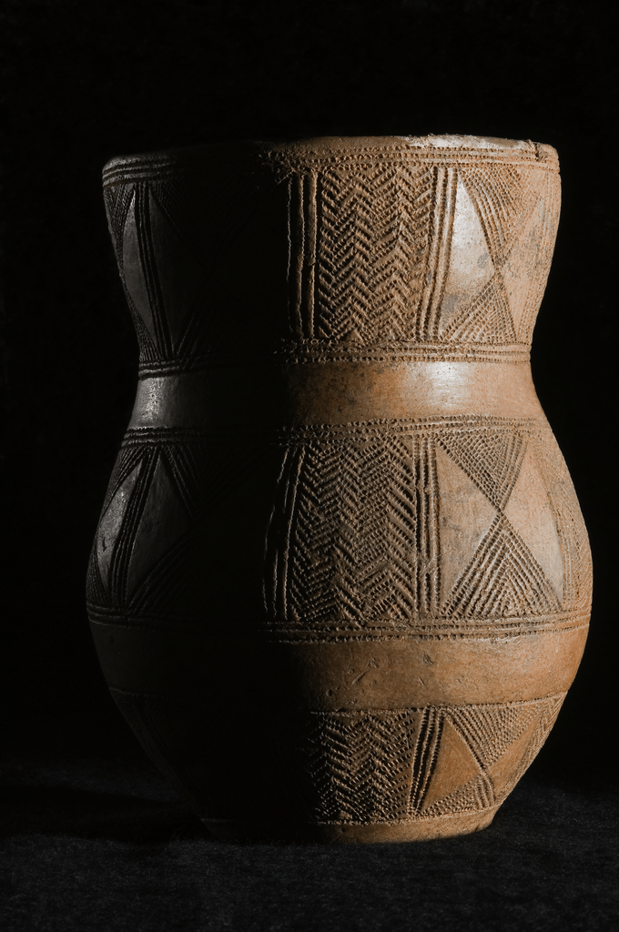 A bronze age 'beaker' pot showing typical geometric decoration.