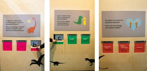 A photo fro the Dippy Abuot Nature Exhibition. It shows a quiz game in which visitors push down a wooden door to reveal answers.