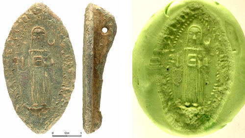 14th-15th-century seal, possibly belonging to an abbess of Llanllyr, alongside its impression in wax. 