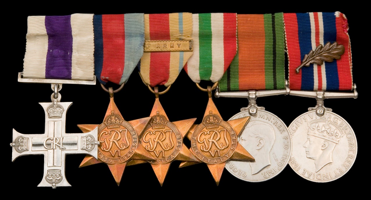 Rev. I.Ll. Phillips’ medals (from left to right): the Military Cross, The 1939-1945 Star, The Africa Star with 1st Army clasp, The Italy Star, The Defence Medal and The War Medal with a bronze oak leaf demonstrating that Phillips had been “Mentioned in De