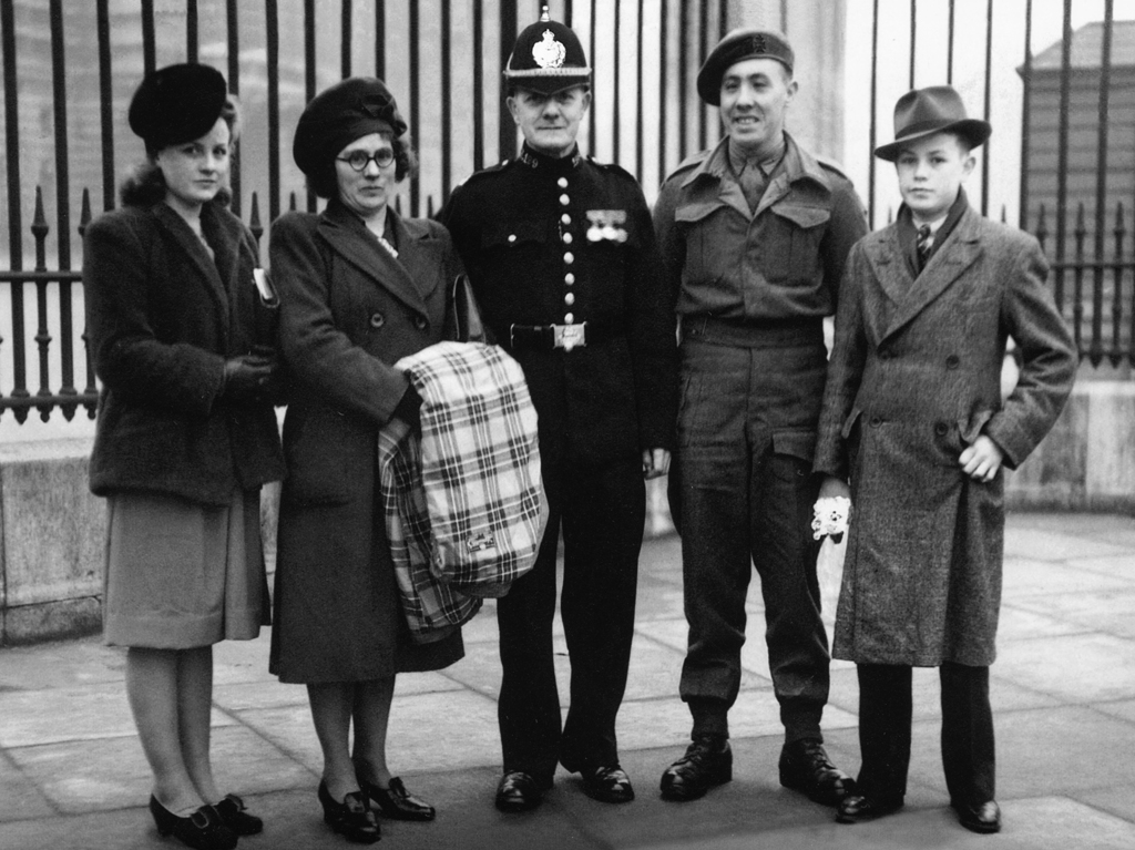 B.L. Aylott and his family following his investiture by King George VI at Buckingham Palace.