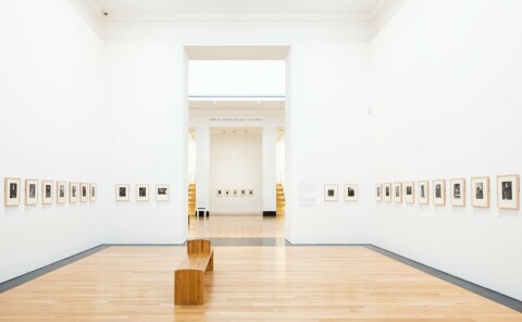 A photograph of the ARTIST ROOMS: August Sander exhibition, showing the entire gallery from the entrance