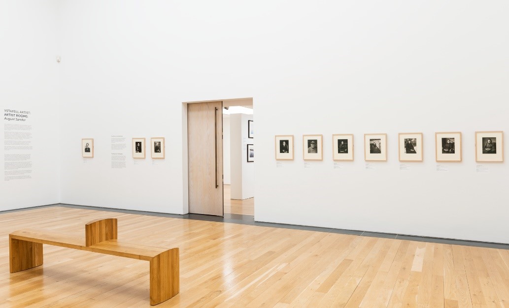 A photograph of the ARTIST ROOMS: August Sander exhibition, showing the east wall of the gallery