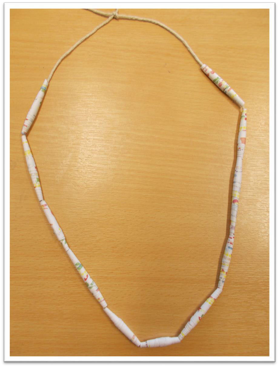 A photo of a completed paper necklace