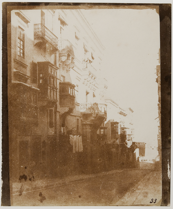 19th-century sepia photograph of a deserted street in Valletta, Malta.