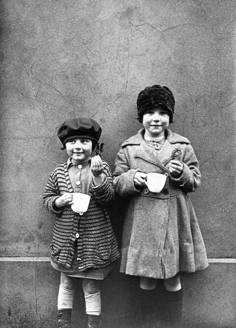 Two girls at Tenby partaking in New Year's water ritual, 1928.