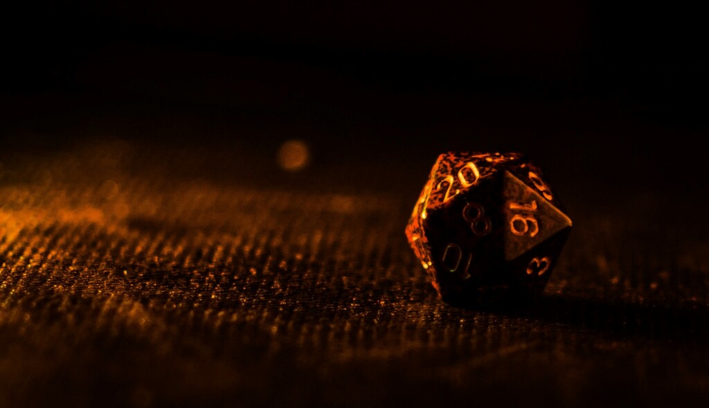 Image of a dice on a table