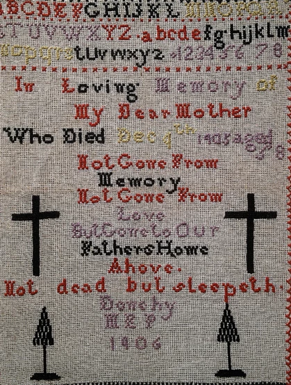 Close up photograph of a patchwork square which was created in memory of the creators mother. 