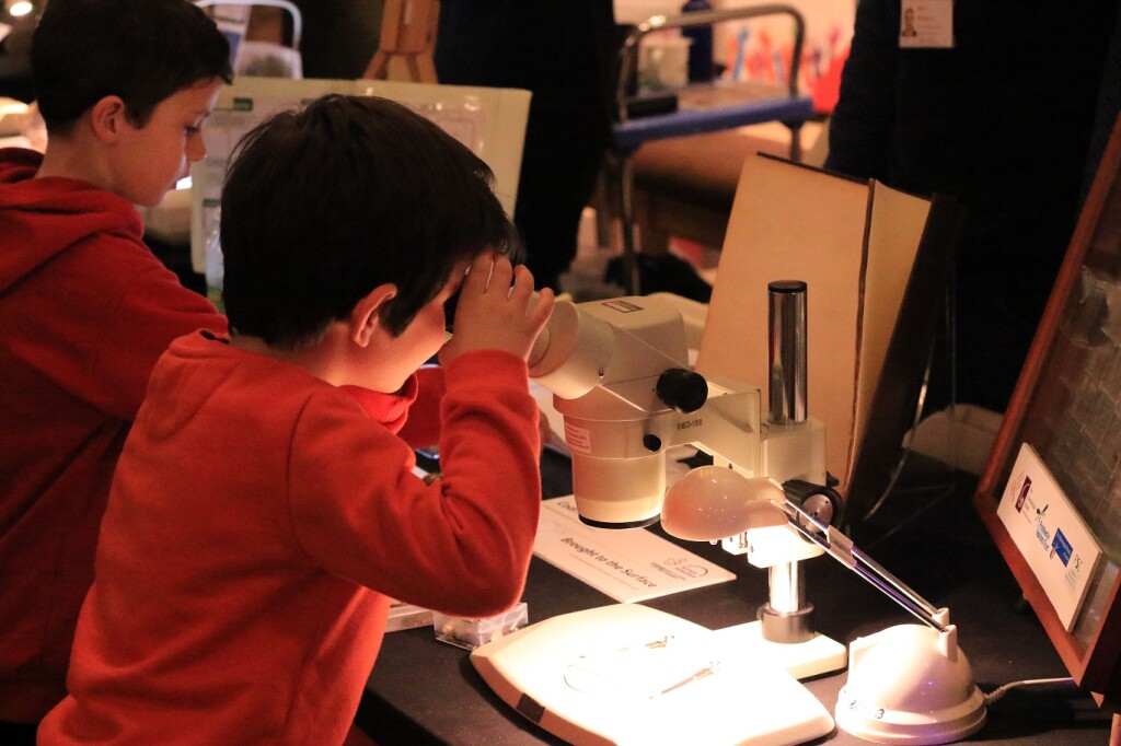Child with a microscope