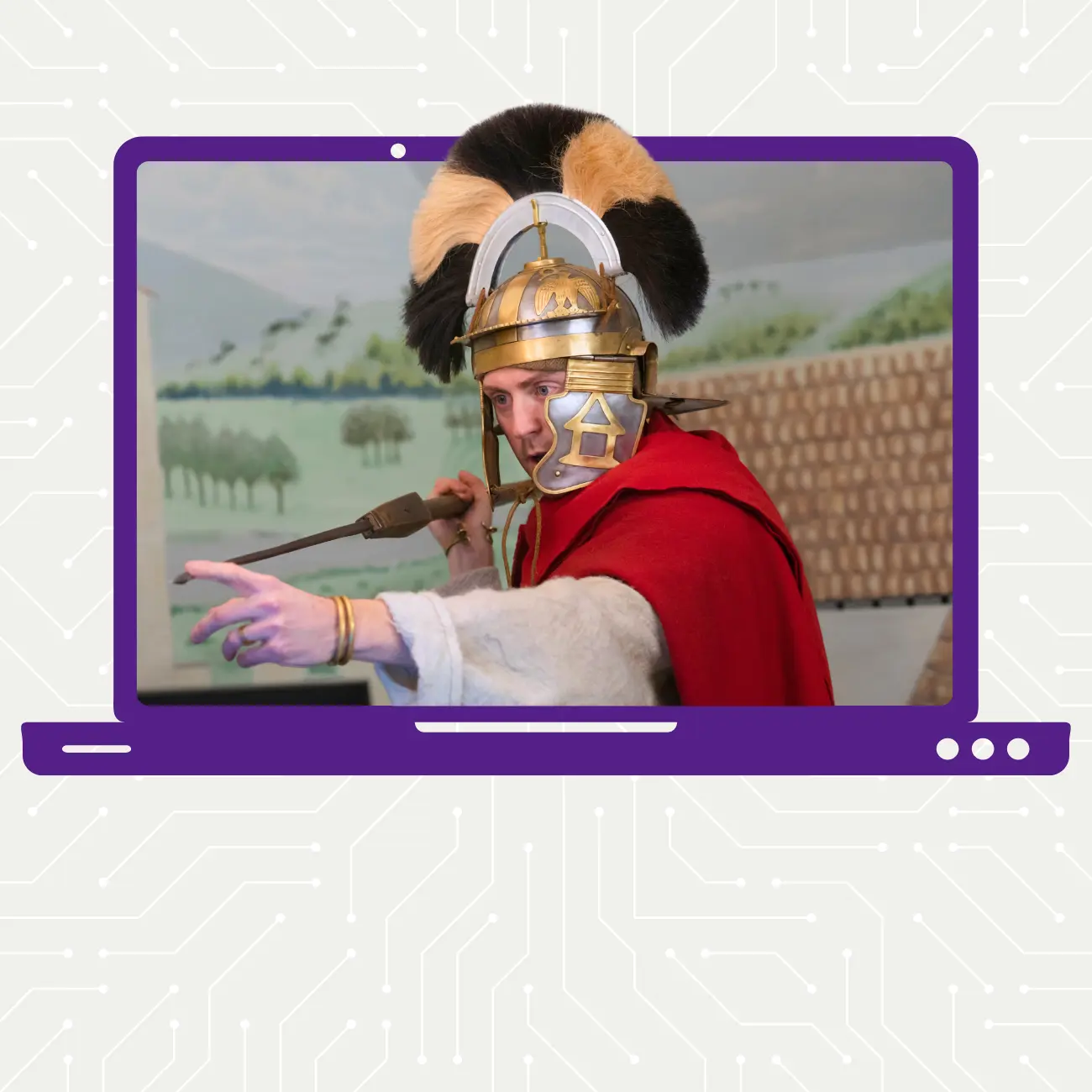 Man in Roman costume points a spear to a camera