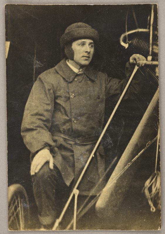 The inventor Charles Horace Watkins standing in front of his monoplane the Robin Goch