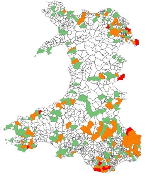 Map of Wales with each county marked on it, some counties have been coloured either green, orange or red to define how many treasures have been found in the area