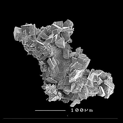 a small fragment bearing blocky arsentsumebite crystals