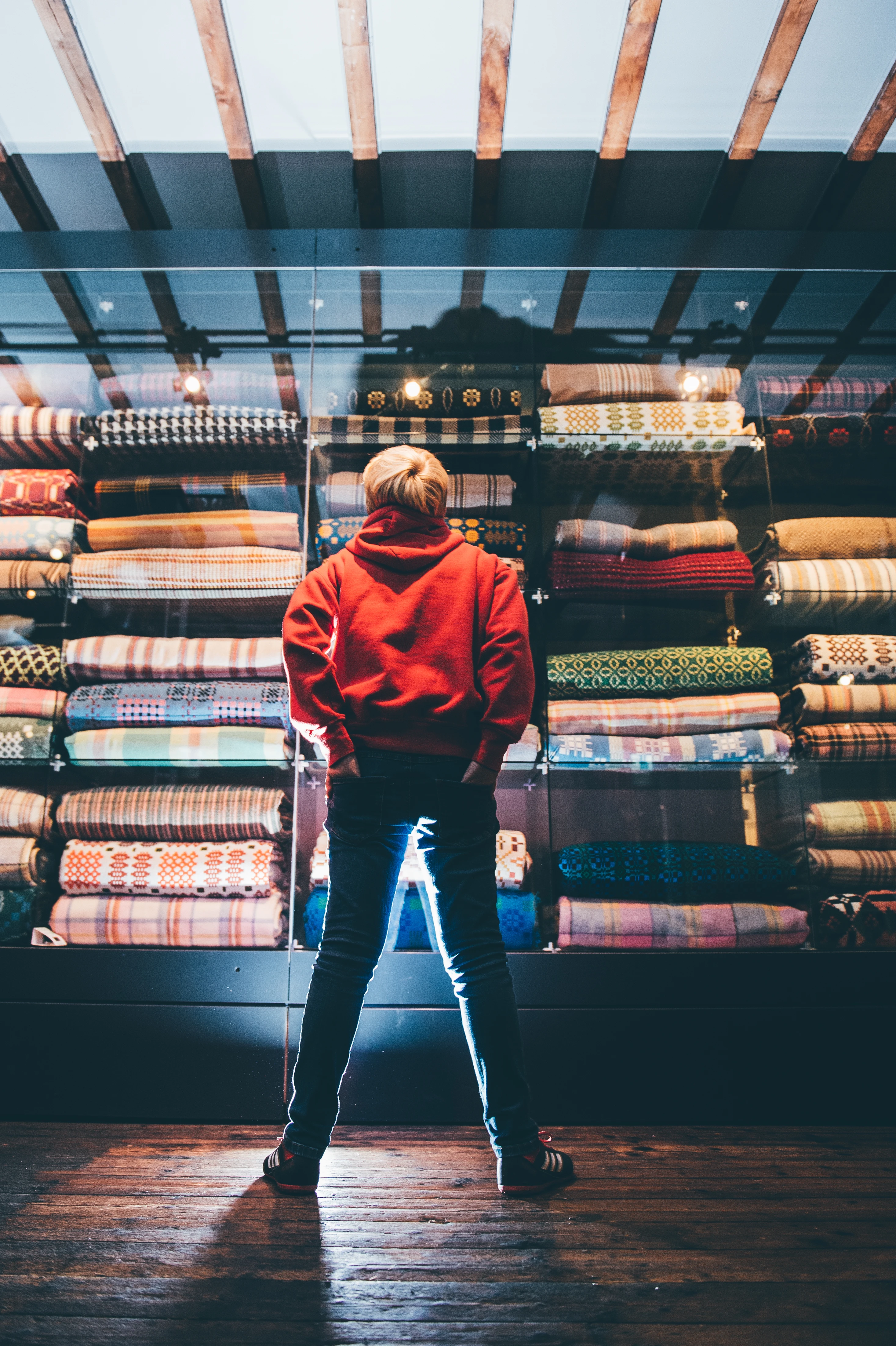 Boy staring at blankets