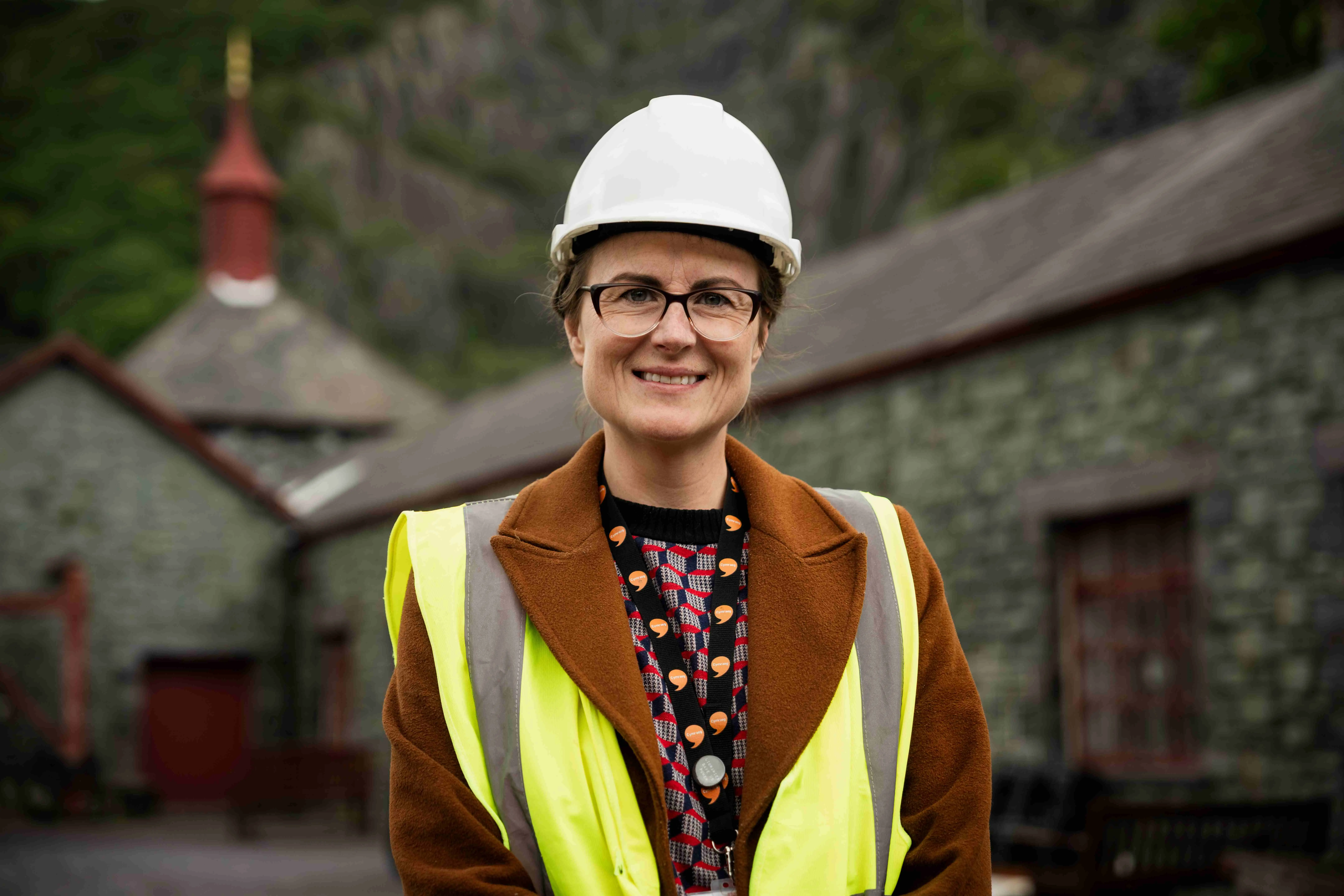 A woman in a hardhat at the National Slate Museum 