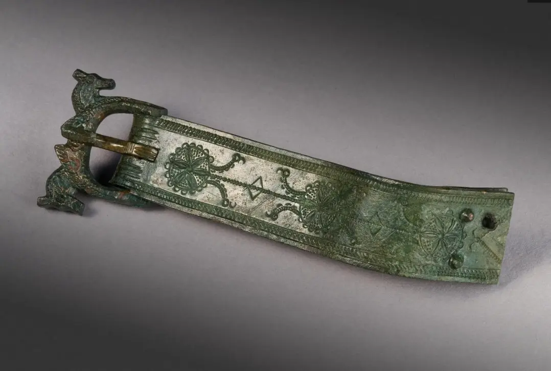 Late fourth-century copper alloy buckle and plate, for a late Roman narrow belt.