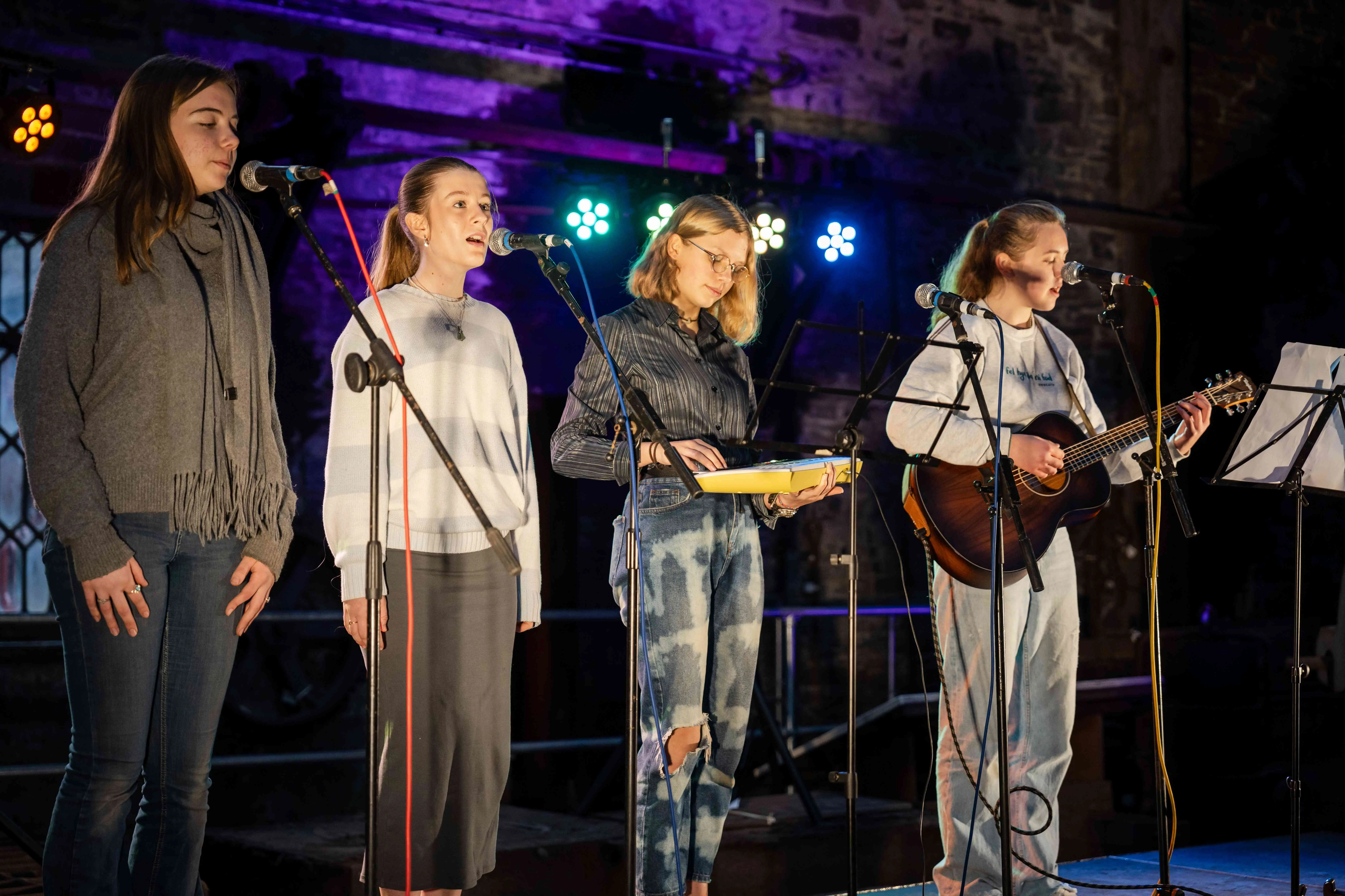 A group of young people singing