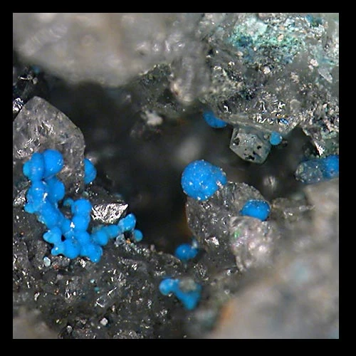 Minute spherical schmiederite aggregates