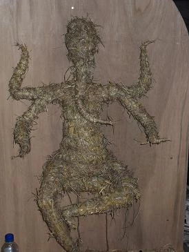Ganesha's body formed by tying hay to a wire frame
