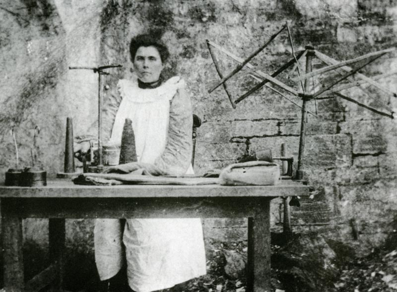 Kathryn Davies operating a stocking-making machine